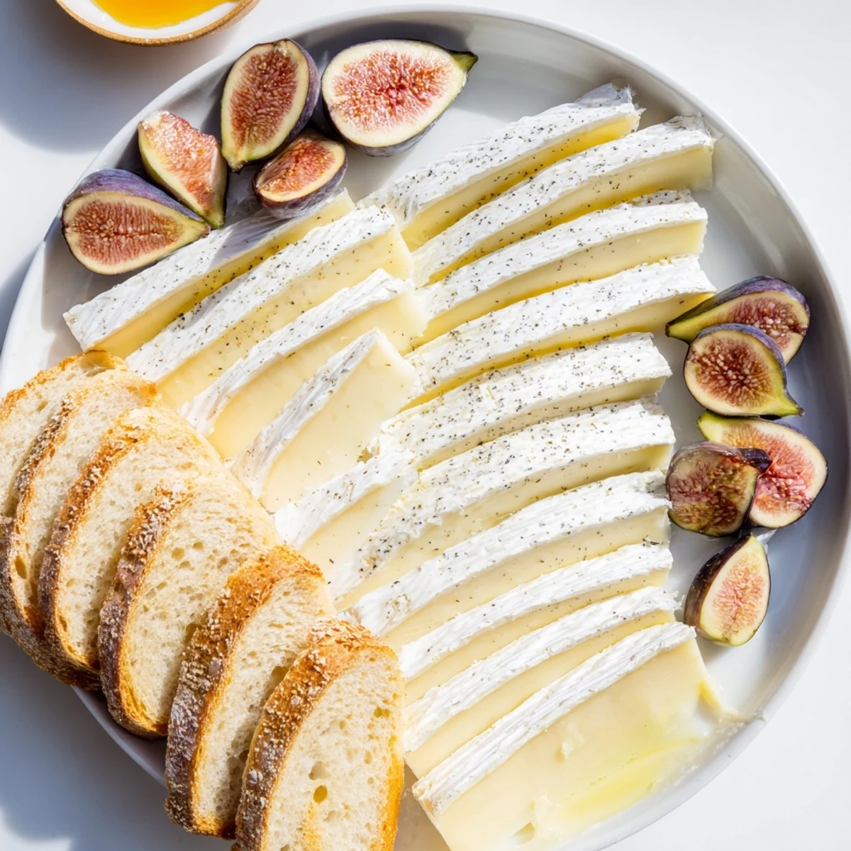 Enjoy the beautiful French Bistro Elegance: a delightful cheese and bread board perfect for sharing.