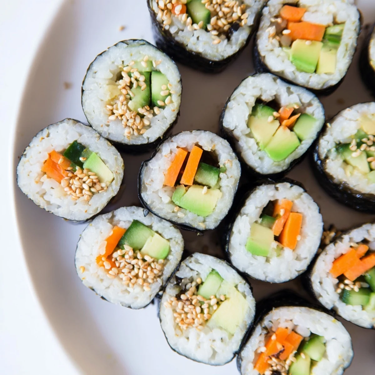 Close-up of freshly made avocado cucumber sushi, showcasing the creamy avocado and colorful fillings.