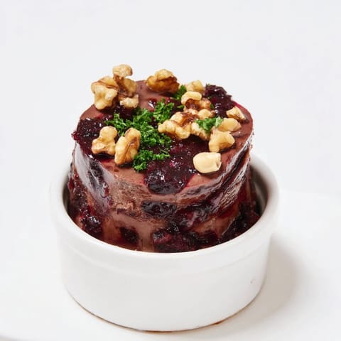 The Velvet Underground appetizer: a taste of creamy pâté, sweet jams, and crunchy nut layers.