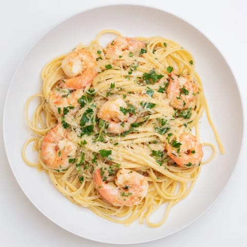 A close-up of Creamy Garlic Shrimp Pasta garnished with fresh parsley, offering a comforting, restaurant-quality meal at home.