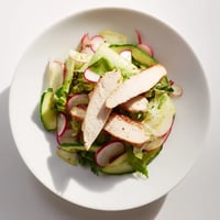 Spring Detox Chicken Salad features tender grilled chicken sliced over crisp mixed greens, cucumber, and peppery radishes with lemon vinaigrette.